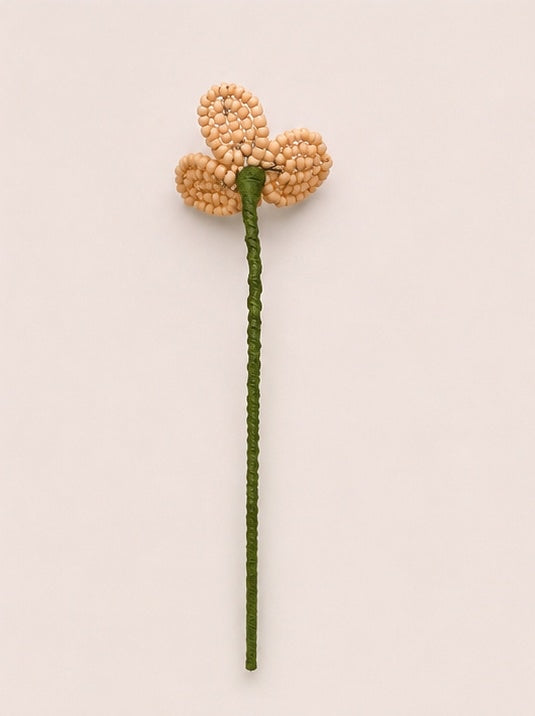 Fleurette, fleur de cerisier en perles de rocaille tissée à la main, vue de dos, tige torsadée, fait main à Châteauroux, Perle Moi Ça