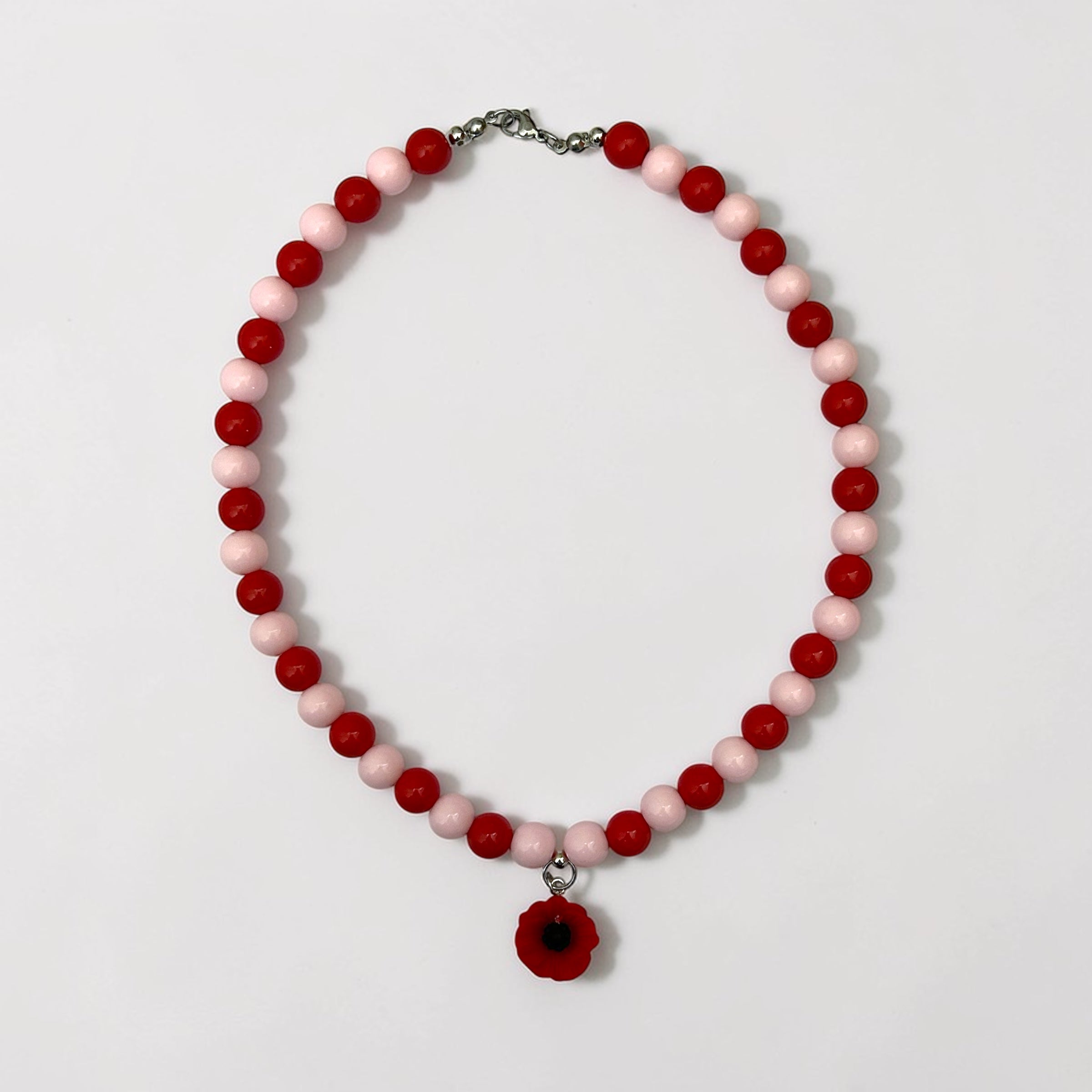 Collier de perle Josette rouge et rose -breloque fleur- Perle Moi Ca