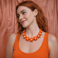 Collier de perle Odette orange -fleur- Perle Moi Ca
