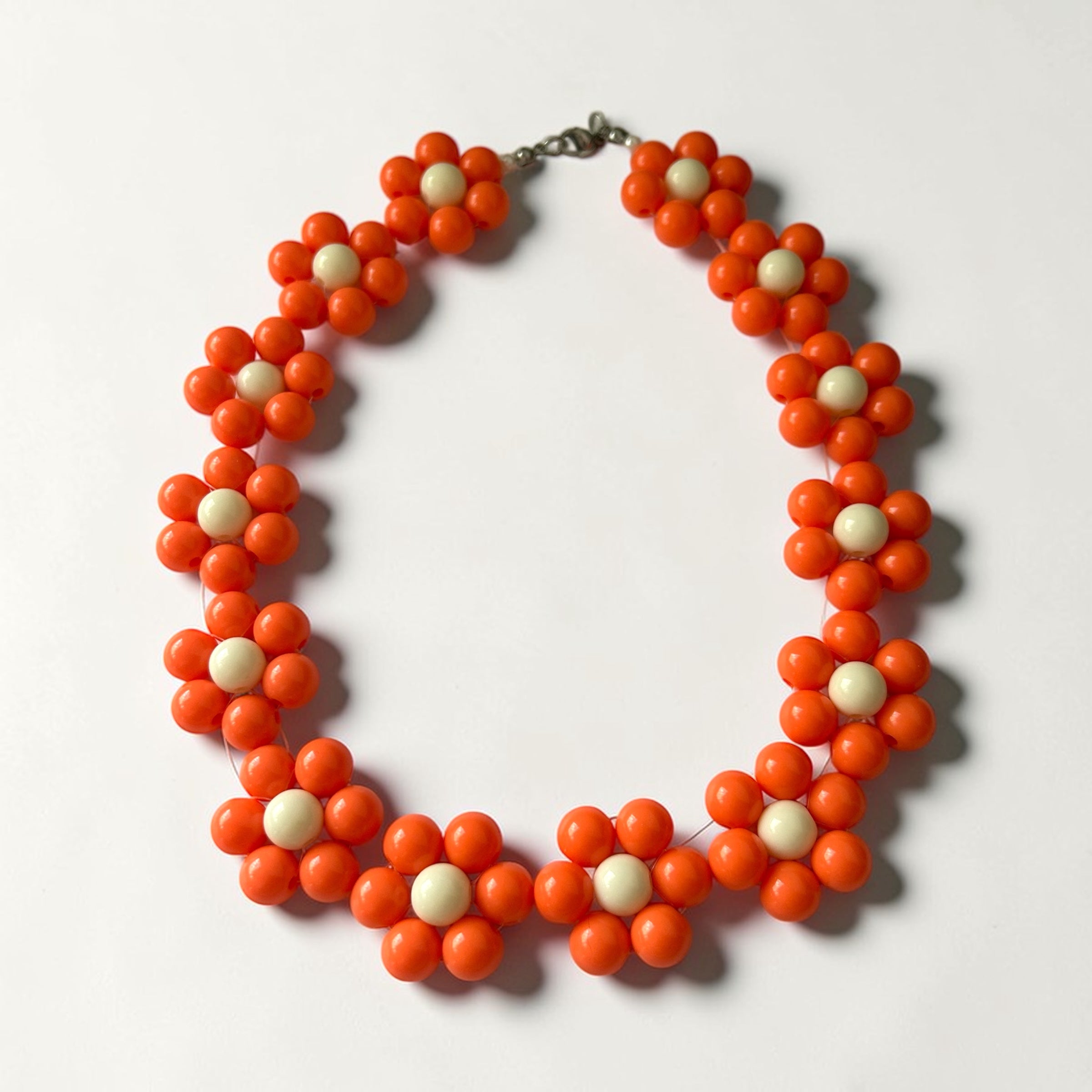 Collier de perle Odette orange -fleur- Perle Moi Ca