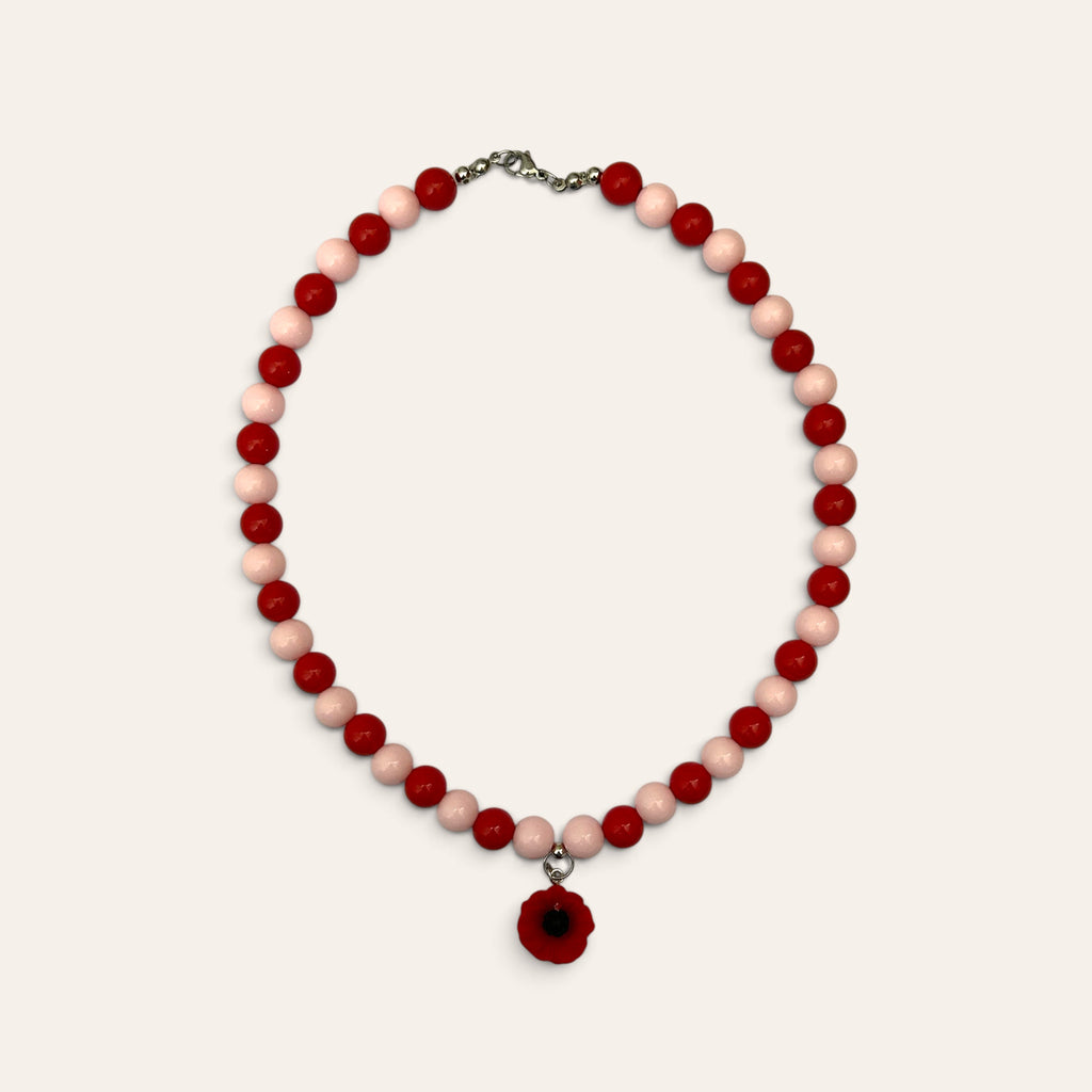 Josette, collier tissé de perles rouges et roses en acrylique, pendentif coquelicot, à plat, Perle Moi Ça