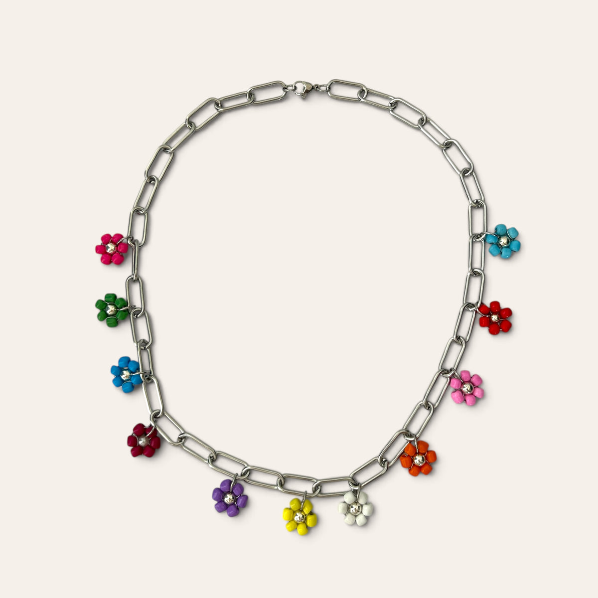 Pierette, collier chaîne trombone argentée à fleurs tissées multicolores en perles de rocaille, à plat, Perle Moi Ça